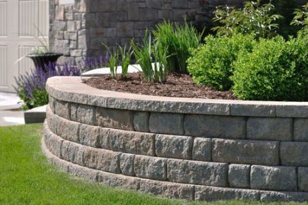 Retaining wall cleaning