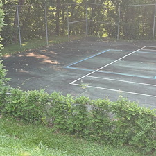 Removing-Years-of-Dirt-from-a-Tennis-Court-in-Lynchburg-VA 2