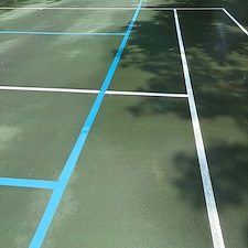 Removing Years of Dirt from a Tennis Court in Lynchburg, VA